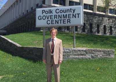 Attorney Tim Theisen in front of the Polk County Government Center